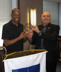 Adrian Bailey accepts his award from Jean-Paul Richard