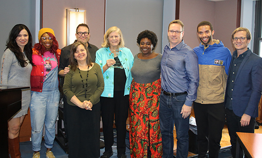 Members of the HEAD OVER HEELS company with presenter John McGinty (right)